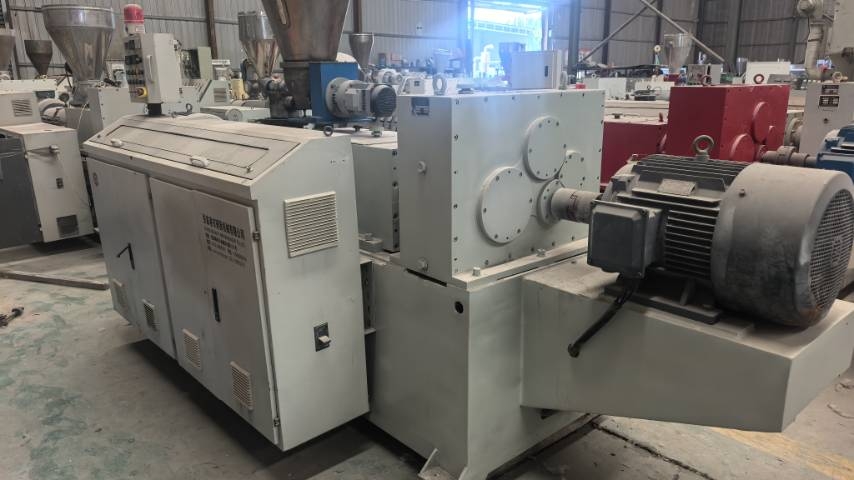 65 twin screw extruder